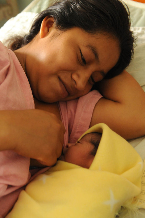 An indigenous Mayan woman breastfeeds her newborn daughter in the maternity ward of Coban Hospital in Guatemala.