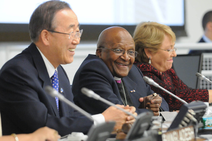 UN Secretary-General addresses the UN, with Archbishop Desmond Tutu sitting beside him.