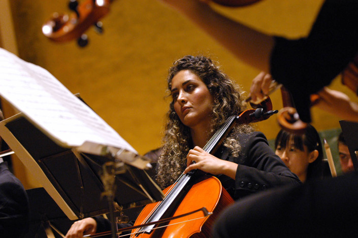 An adolescent girl plays the cello at the UN.