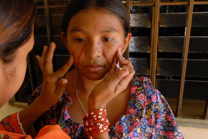 Indigenous Wayuu adolescent prepares for dance.