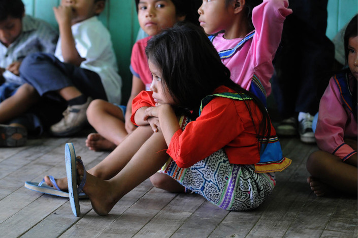 Children participate in a language class in the indigenous Shipibo-Conibo community of Nuevo Saposoa in the Peruvian Amazon.