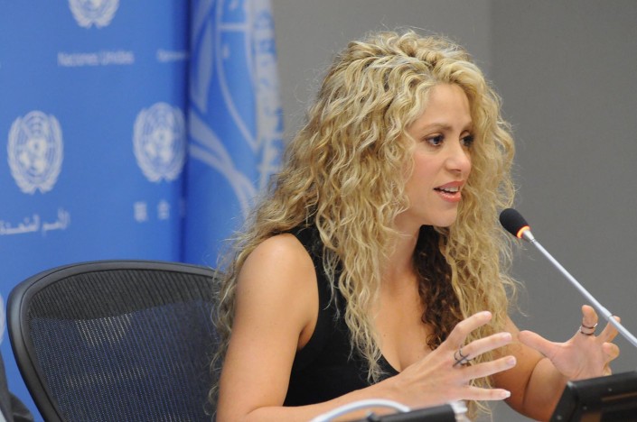 Shakira addresses media during a press conference at the United Nations.