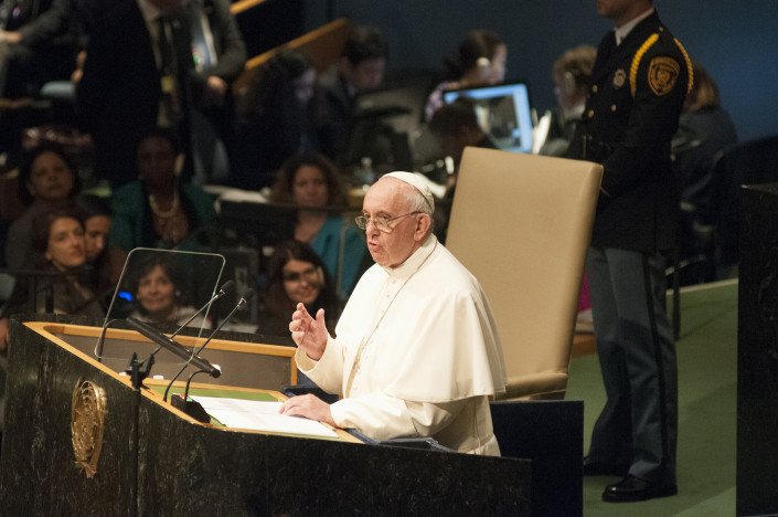 Pope Francis gestures while addressing the United Nations General Assembly.