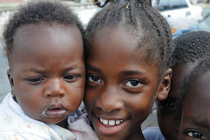 Smiling children from the Kingston community of Trenchtown in Jamaica.