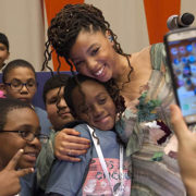 (Right) Performer Chloe Bailey from 'Chloe x Halle' embraces a girl as she is photographed at a rehearsal ahead of Monday's event to mark World Children’s Day at the United Nations Headquarters, on 19 November 2017.