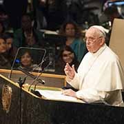 Pope Francis gestures while addressing the United Nations.
