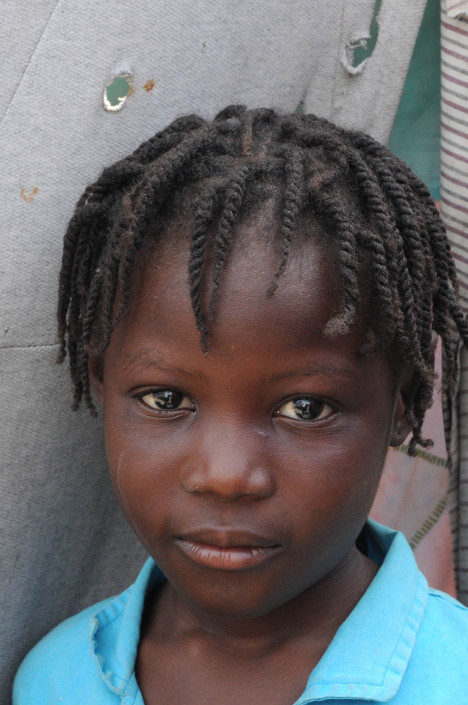A displaced Haitian girl after the 2010 Haiti earthquake in Carrefour Aviation.