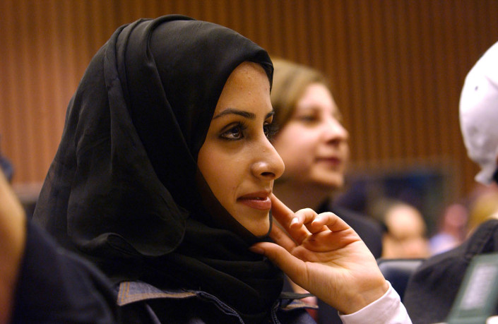 Qatari child delegate wearing a head covering at the UN.