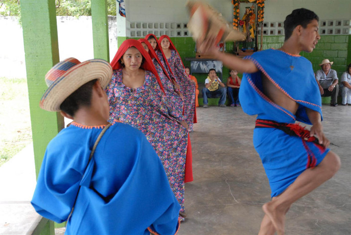 Adolescents participate in a Wayuu traditional dance in a community center in Paraguaipoa, Venezuela.