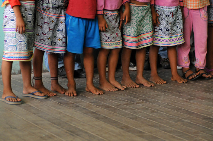 Children stand inside their classroom in the indigenous Shipibo-Conibo community of Nuevo Saposoa in the Peruvian Amazon.