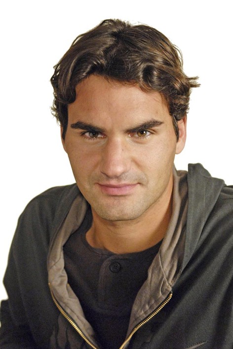 Tennis Ace Roger Federer poses for a portrait in a studio.