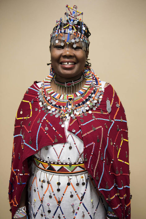Portrait of Masai activist in colorful traditional wedding costume.
