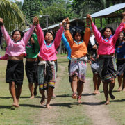 Indigenous Shipibo Conibo women from Nuevo Saposoa in rural Peru, do a welcome dance for visitors to their community.